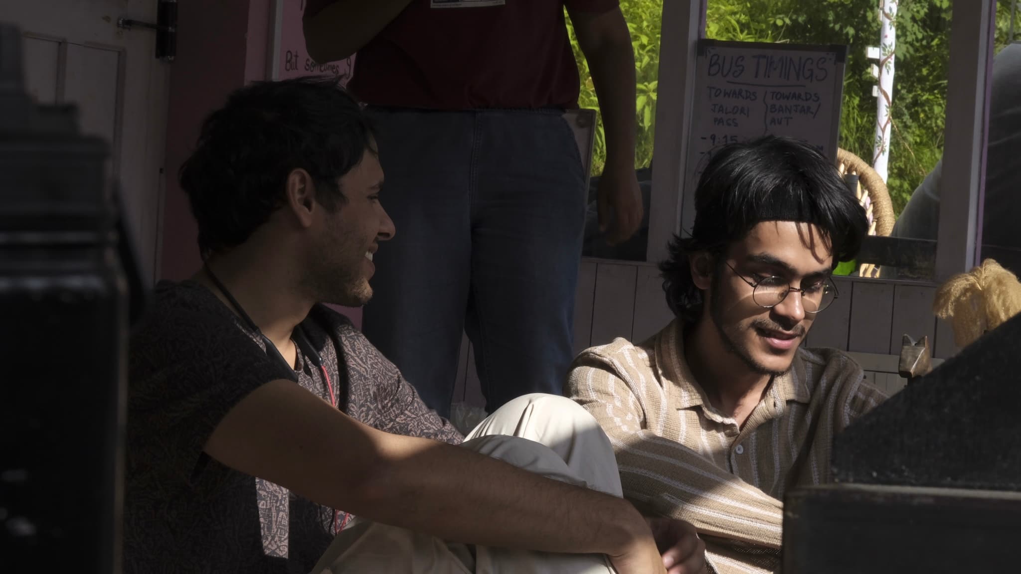 An image of two people talking.